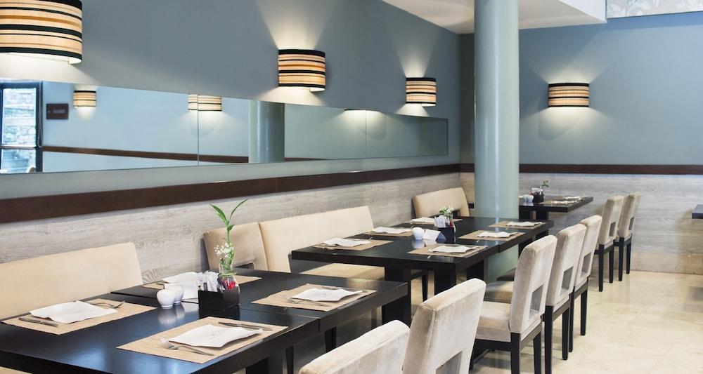 Palacio De Aviles Affiliated By Melia Εξωτερικό φωτογραφία Restaurant interior