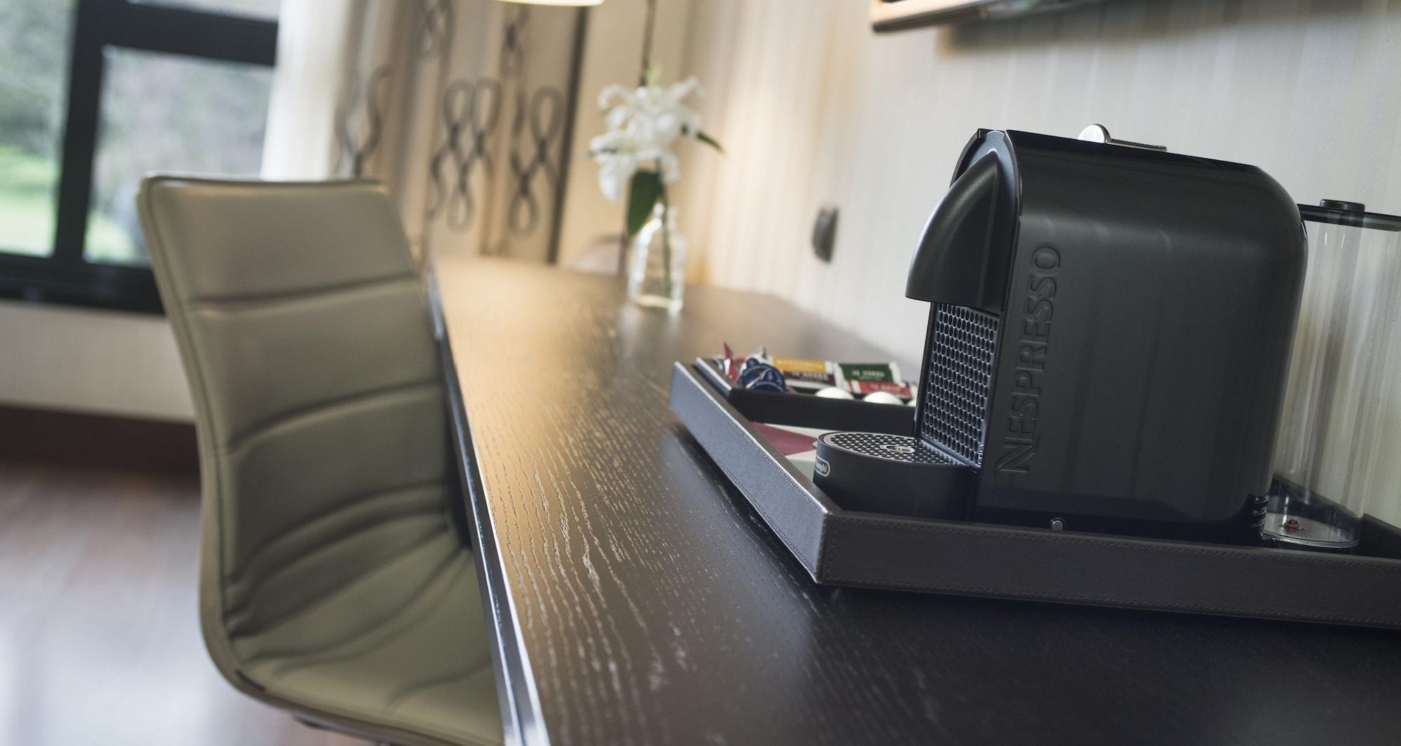 Palacio De Aviles Affiliated By Melia Εξωτερικό φωτογραφία A Nespresso machine in a hotel