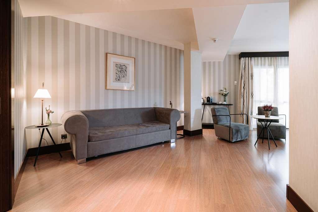 Palacio De Aviles Affiliated By Melia Δωμάτιο φωτογραφία A room at the hotel